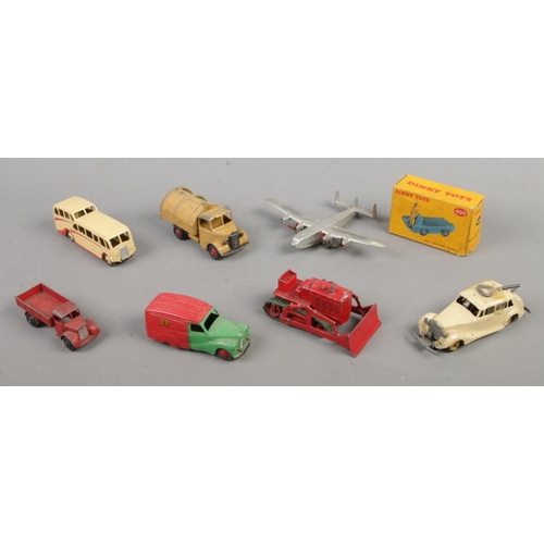 109 - A small collection of mostly vintage Dinky Toys diecast vehicles. Includes boxed Dinky Toys B.E.V El... 