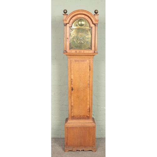 619 - A Nineteenth Century oak longcase clock, with brass dial labelled for James Todd, Bradford. Featurin... 