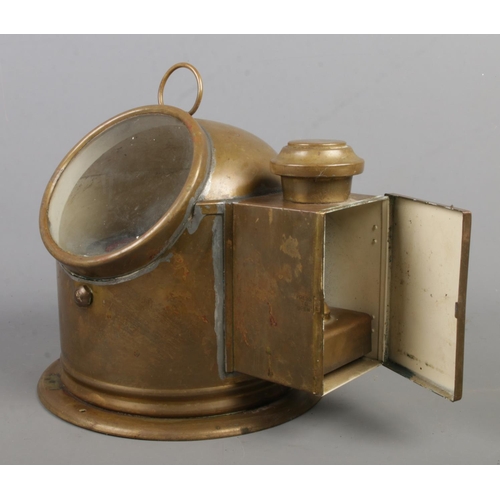 145 - A Sestral brass binnacle/gimbal compass, complete with burner.