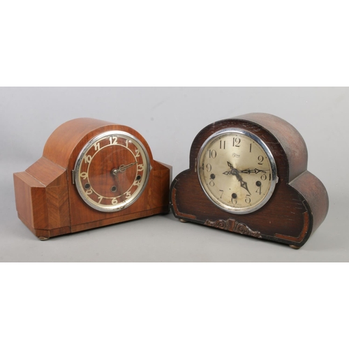 148 - Two wooden cased mantel clocks. Includes Tymo example.