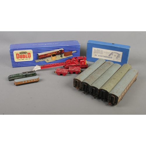 160 - A quantity of mostly Hornby Dublo. Includes crane, boxed T.P.O Mail Van Set, carriages, boxed D1 Foo... 