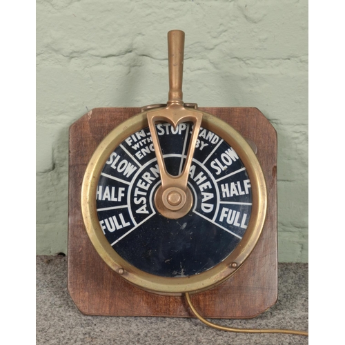 163 - A brass ship's telegraph, mounted on wooden plaque, converted into a lamp.