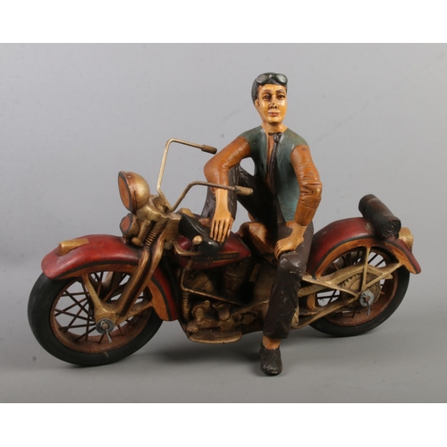174 - A large composite figure of a man on Harley Davidson motorbike.