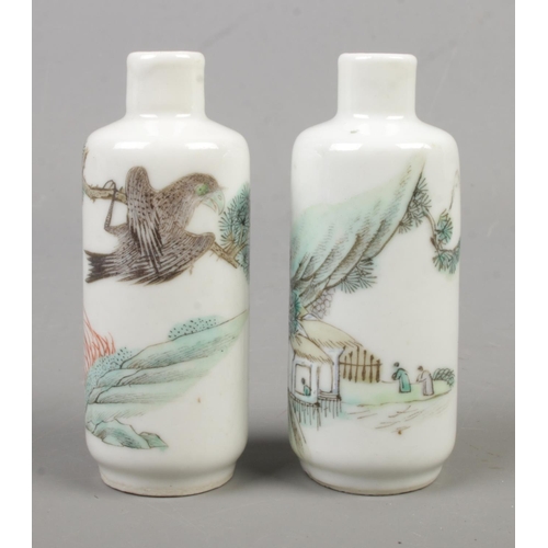 210 - A pair of unmarked miniature oriental hand painted vases depicting farming landscape and animal scen... 