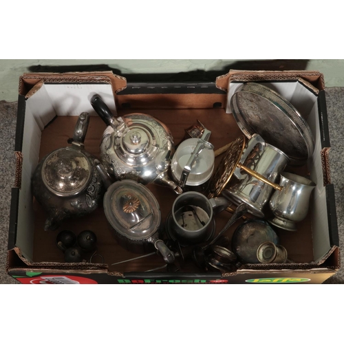 223 - A box of metalwares. Includes silver plated teaset, cruet sets, etc.