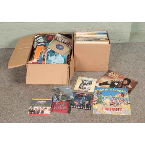 243 - One box of vinyl LP records and one large box of vinyl singles of mainly pop and easy listening to i... 