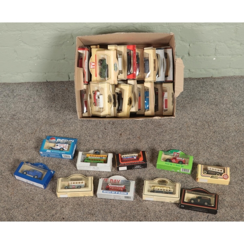 257 - A box of assorted diecast vehicles to include Days Gone, Pepsi, Lledo, Guinness, 7Up, etc.