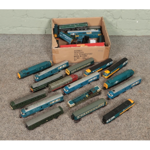 258 - A good collection of OO Gauge rolling stock to include various carriages and locomotives produced by... 