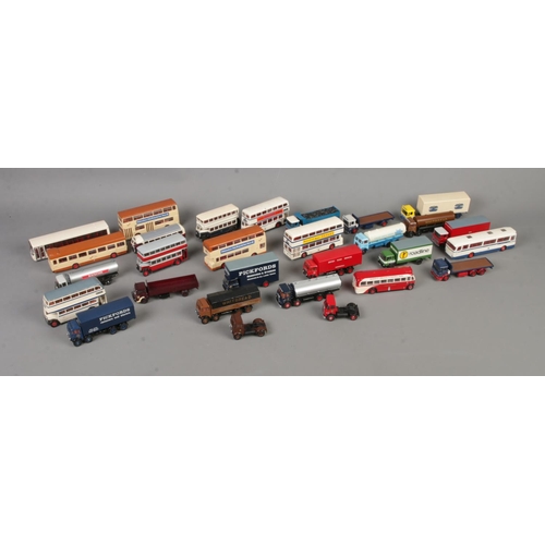 264 - A collection of Exclusive First Editions diecast vehicles to include several buses, tankers and truc... 