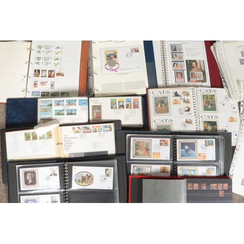 275 - A large quantity of British stamps, presentation packs and first day covers. Mostly in albums. Inclu... 