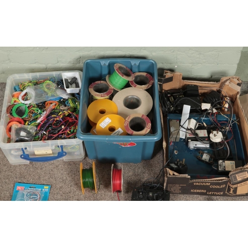 290 - Three boxes of mostly electronic spares and repairs intended for model railway. Includes several cab... 