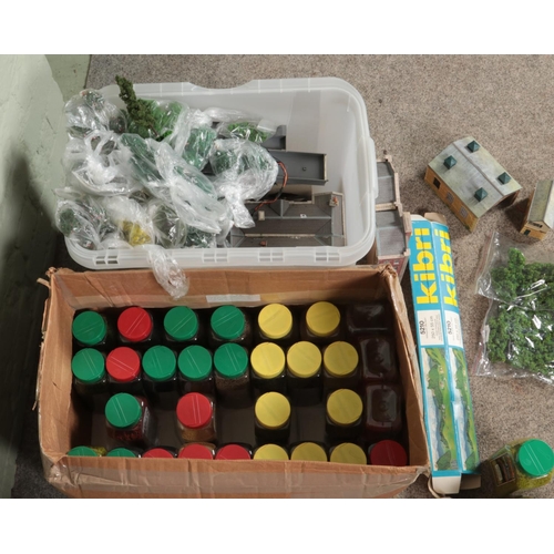 296 - Two boxes of model railway scenery and diorama building supplies to include several tubs of Flock & ... 