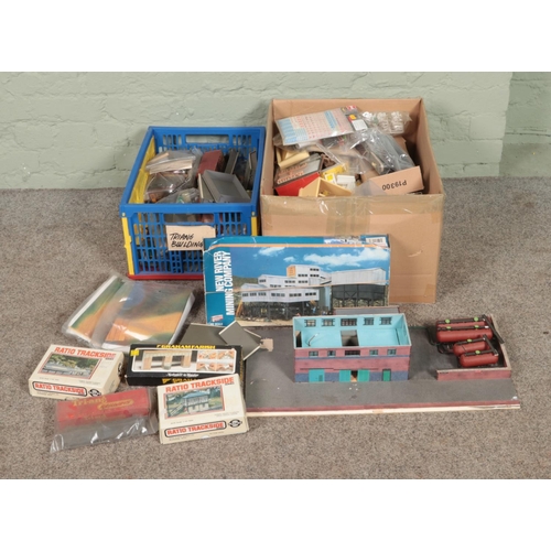 298 - Two boxes of assorted model railway building, scenery and diorama supplies to include backgrounds, c... 