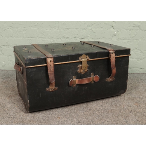 317 - A vintage tin trunk. The clasp marked for Bates, Wolverhampton.