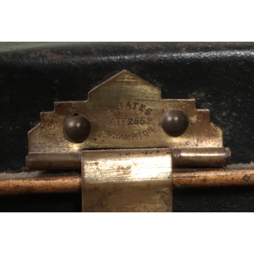 317 - A vintage tin trunk. The clasp marked for Bates, Wolverhampton.