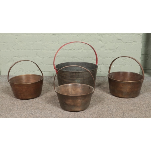 320 - Four jam pans, of varying size. Largest - Height: 45cm Diameter: 42cm.