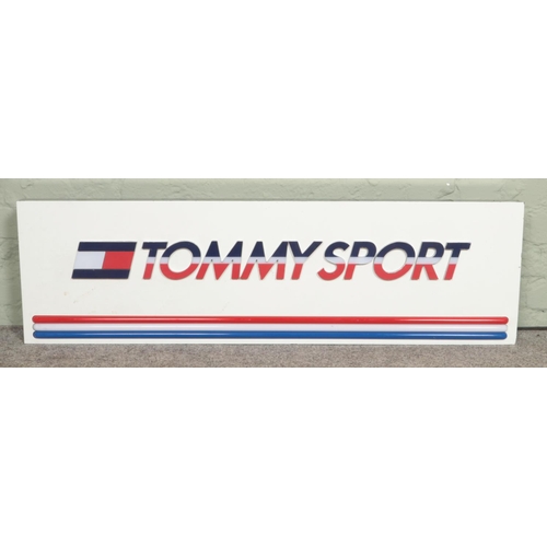 348 - A shop advertising lighting sign for 'Tommy Sport'; Tommy Hilfiger. 121cm long.