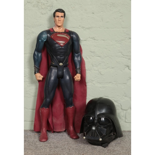 355 - A Jakks Pacific Superman figure; 78cm high, together with a Darth Vader voice changing mask.