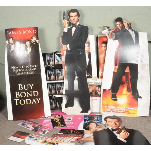 357 - A large collection of James Bond movie advertising and point of sale pieces from various bond films ... 