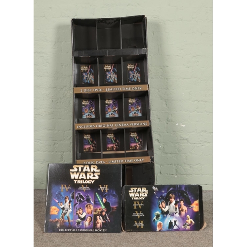 366 - A Star Wars Trilogy point of sale DVD rack and two promotional window cards CAN NOT POST