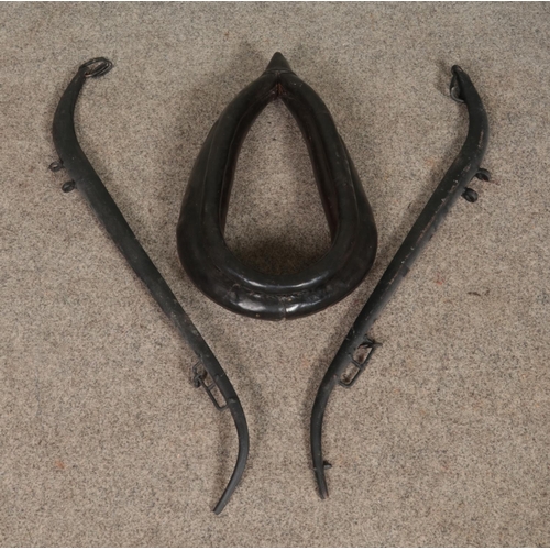 371 - A small leather horse collar along with a pair of iron horse hames.