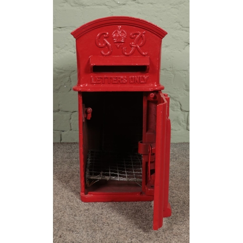 376 - A George VI cast iron hanging postbox, with arched top and makers W.T. Allen and Co. London to the r... 