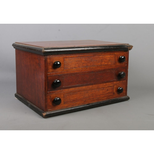 384 - A mahogany table top three drawer specimen chest. 25cm x 43cm x 30cm.