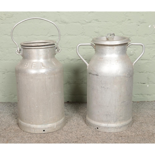 389 - Two aluminium milk jugs, produced by Hugonnet and Schmid, stamped BEL I and CLPS. Tallest example: 5... 