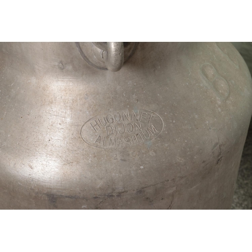 389 - Two aluminium milk jugs, produced by Hugonnet and Schmid, stamped BEL I and CLPS. Tallest example: 5... 