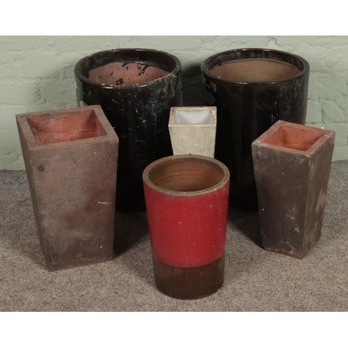 395 - A quantity plant pots, including two Apta examples; 45cm tall.