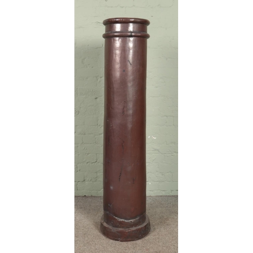 415 - A 19th century 'Long Tom' tall standing chimney pot. Height 151.5cm.