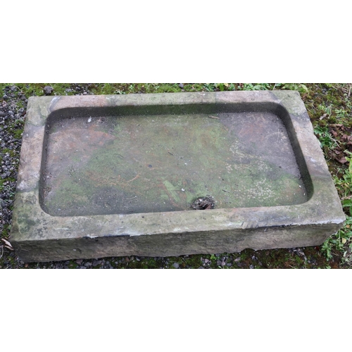 420 - A large concrete shallow trough. (H19cm x W108 x D61cm)