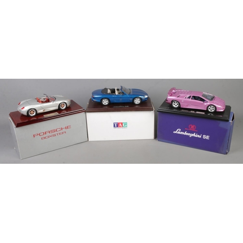 65 - Two Gwilo International Limited and Tag Precision Models diecast vehicles. Includes Jaguar XK8, Lamb... 