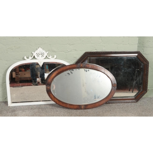 458 - Three vintage bevel edge mirrors. Includes painted brass example and two wooden framed examples.