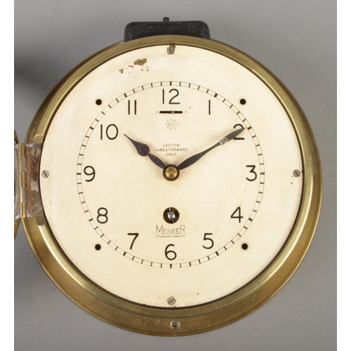 69 - A Mercer (St. Albans, England) 'Octo' brass bulkhead clock. With serial number to surround A.P W6578... 