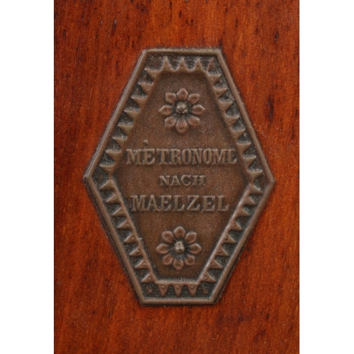 73 - Two mahogany cased metronomes stamped for 'Metronome de Maelzel' and 'Metronome Nach Maelzel'. 22cm ... 