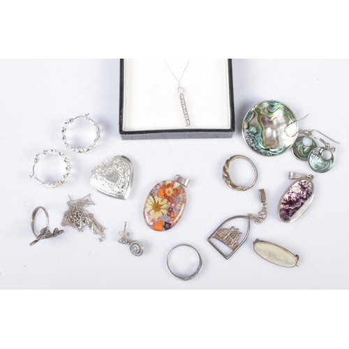 473 - A quantity of silver and white metal jewellery. Includes rings, necklaces, pendants, etc.