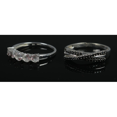 479 - Two 9ct white gold rings one set with black diamonds, one with astraeolite stones. Each with certifi... 