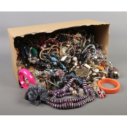 80 - A large box of costume jewellery