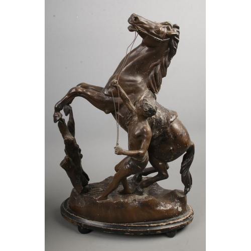 83 - A pair of spelter Marley Horses, 42cm tall. Stamped 'Made in England to the bases.