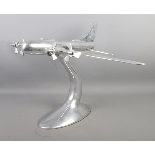 90 - A large chromed model of a four engine plane. 40cm high.