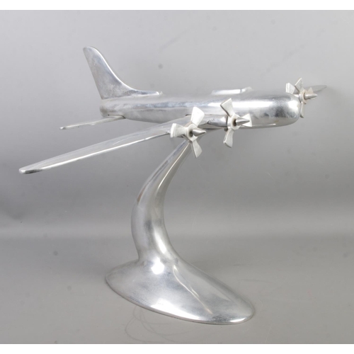 90 - A large chromed model of a four engine plane. 40cm high.