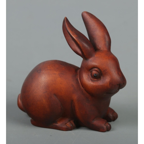 524 - A hand carved hardwood netsuke of a rabbit