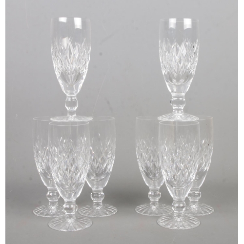 531 - A set of eight Waterford Crystal Boyne pattern champagne flutes, 15cm tall.