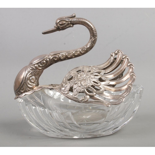 546 - Two cut glass and silver swan dishes, possibly salt sellers. With moving wings and pierced and scrol... 