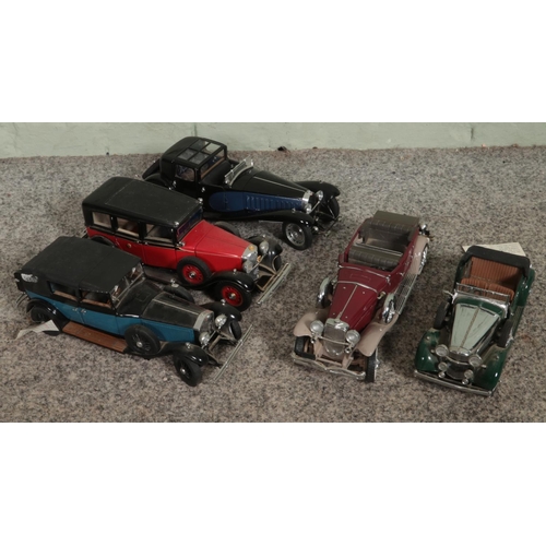 94 - Five boxed Franklin Mint Precision Models. Includes 1929 Rolls Royce Phantom I, The 1930 Bugatti Roy... 