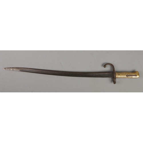 559 - A French M1866 bayonet. Blade length 52.5cm. CANNOT POST OVERSEAS