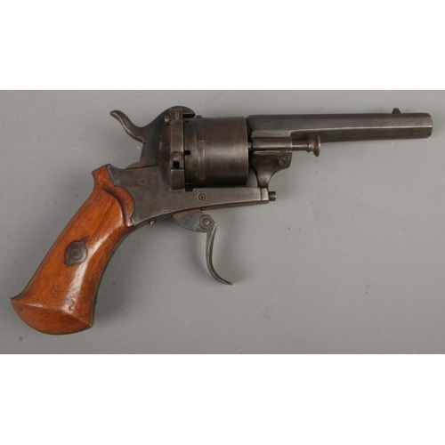 564 - A late Nineteenth Century Belgian six-shot pin fire revolver, with octagonal barrel. Bearing Belgian... 