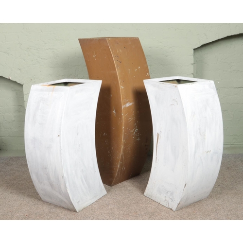 329 - Three modernist fibre glass planters. Heights 120cm and 90cm.