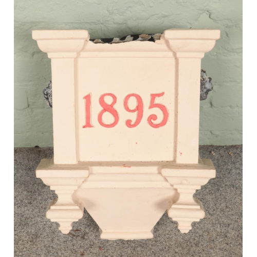 399 - A Victorian painted cast iron drain hopper, dated 1895.